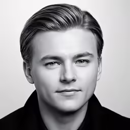 a black and white photo of a man