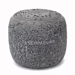 a stone stool with words painted on it