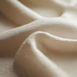 white sand with tiny ridges and dots is seen here