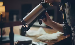 a person holding a camera like something else