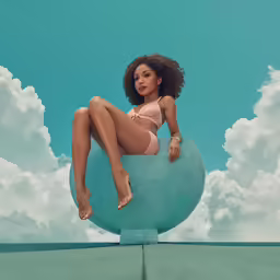 an illustration of a woman wearing a bra sitting on top of a statue