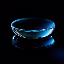 a small glass dish on top of a table