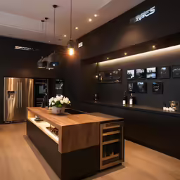 a well organized and modern kitchen design with dark cabinets