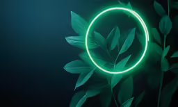 a green ring with leaves on top and a dark background