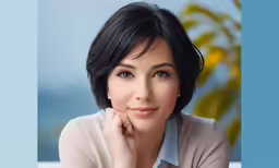 a woman that is looking to her left with a hand on her face