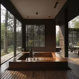 a bathtub sitting in the middle of a living room filled with windows