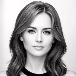 a woman with long hair and a black dress
