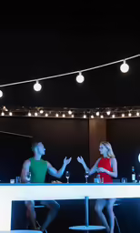 man and woman sitting at a table talking
