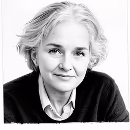 an old black and white photograph shows a woman with short hair