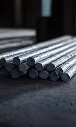 several small pieces of metal sitting on a table