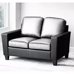 the leather loveseat is sitting next to a window