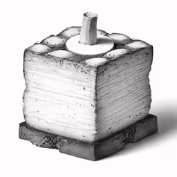 an apple made out of multiple pieces of concrete