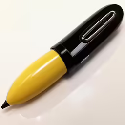 a pen sitting on top of a white table