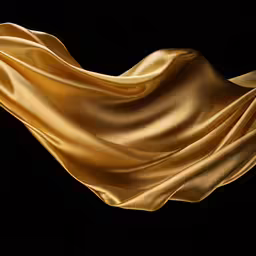 a black background with shiny gold fabric waving