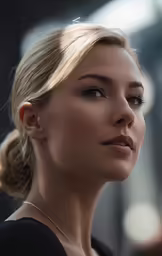 a close - up portrait of a woman with her hair in pigtails
