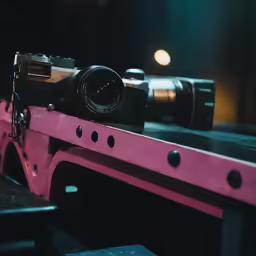 a camera and lens are seen on the top of a camera