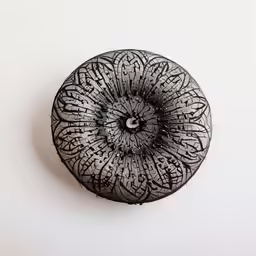 an object that looks like a flower on the table