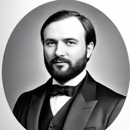 an artistic portrait of a bearded man in a suit