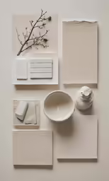 an assortment of white objects, including vase, bowl and utensils