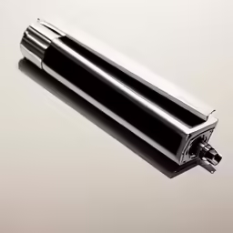 an electronic device sits next to the battery holder