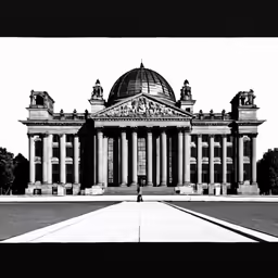 black and white photo of old building with columns