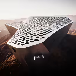 the top of a building with holes in it