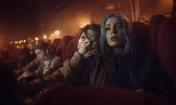 a group of people sitting in a room