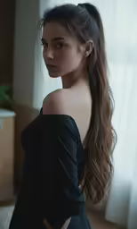 a girl with very long hair in a black dress