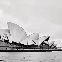 black and white photograph of the opera in sydney