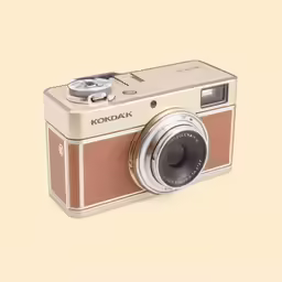 an old fashioned camera that is on display