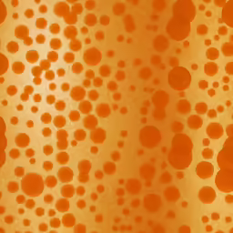 an orange spot pattern that is being used as a background