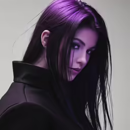 a woman with long dark purple hair, her eye and chin are to the side