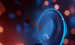 a circular object is shown in a photo with bright blue lights