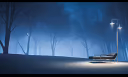 an empty bench under a street light with trees