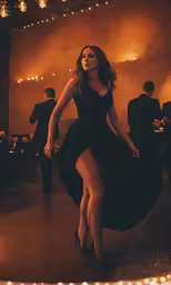 a woman in a black dress is dancing