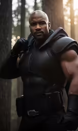 a black man in a leather outfit posing for the camera