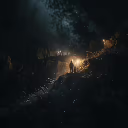 there is a man that is standing in the night