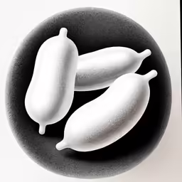 a plate full of two eggplant and another type of pod