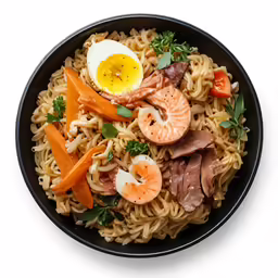 a plate full of noodles with some meat and egg