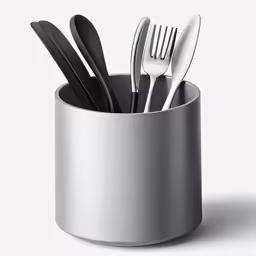 a silver cup holds three forks and two knives