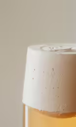 a beer is next to a wall