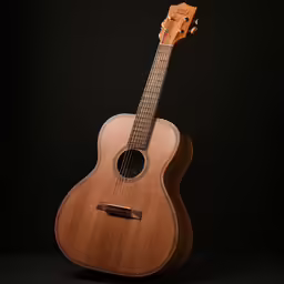 the guitar is lying on its side against a black background