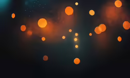 a blurry photo of some orange lights
