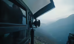 the view from inside the vehicle of the mountainous area