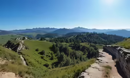 the sun shines brightly above some mountains and grass