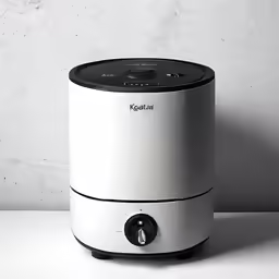 a white machine is sitting on a table
