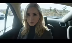 there is a woman that is sitting in the car