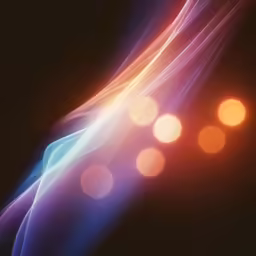 a group of different colored lines in the dark