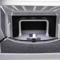 a chair and a tv screen is sitting on the floor