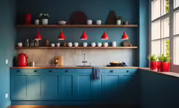 a kitchen has blue cabinets and shelves with red lights